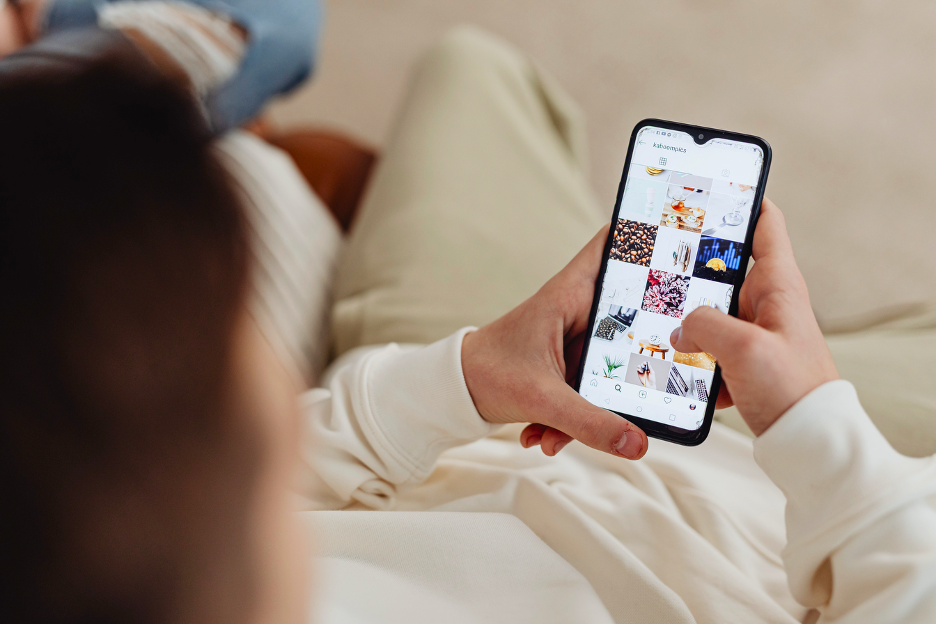 Woman scrolling thorugh image based social media
